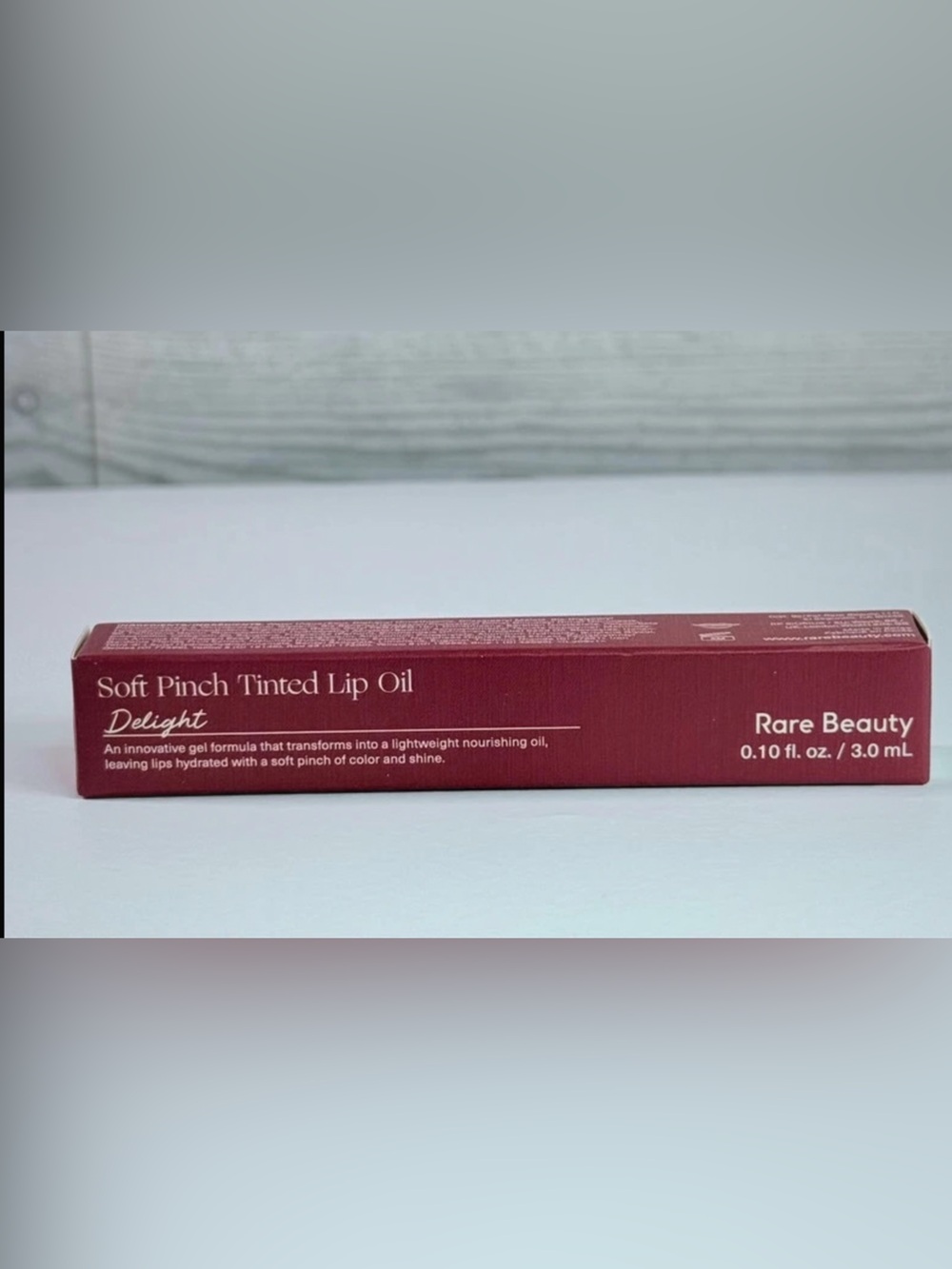 Rare beauty Tinted Lip Oil in shade Delight